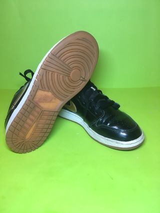 Nike Air Jordan 1 Low Negro Dorado