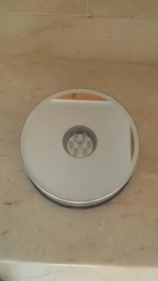 Expositor LED giratorio espejo cristal