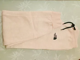 Pantalón chándal The North Face rosa salmón