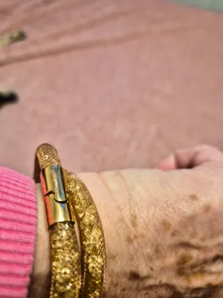 Pulseras Swarovski Doradas .