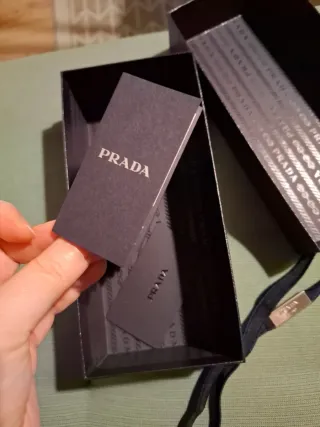 Bolsa y estuche para gafas Prada