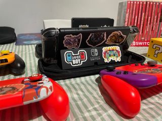 Nintendo Switch OLED+12juegos+4 pares de joycons