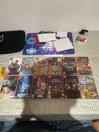 Nintendo Switch OLED+12juegos+4 pares de joycons