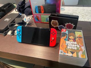 Nintendo Switch OLED+12juegos+4 pares de joycons