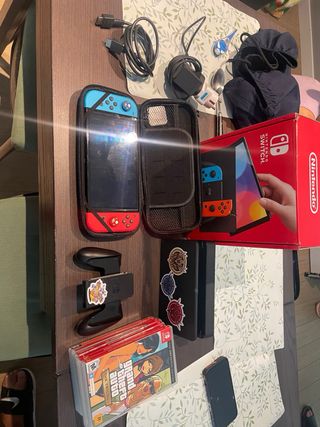 Nintendo Switch OLED+12juegos+4 pares de joycons