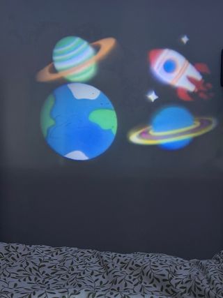 Proyector LED Casalux con trípode y 3 diapositivas