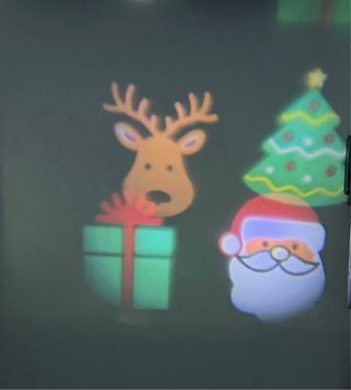 Proyector LED Casalux con trípode y 3 diapositivas