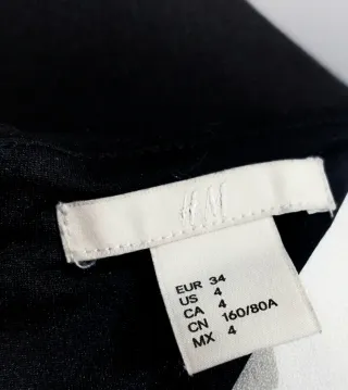 Vestido negro H&M abertura espalda. H&M