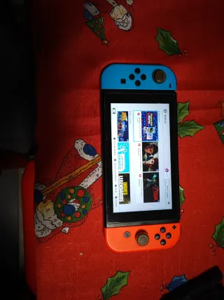 Swicht + 6 juegos + 4 mandos + funda de transporte