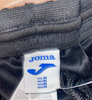 Pantalón de chándal Joma negro y rojo