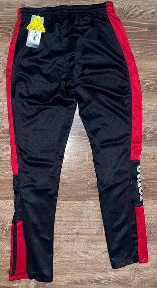 Pantalón de chándal Joma negro y rojo