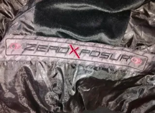 Abrigo Zeroxposur Negro/Morado.