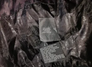 Abrigo Zeroxposur Negro/Morado.