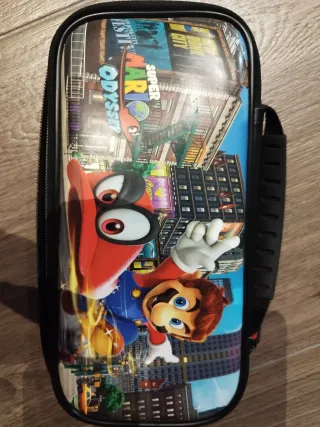 Nintendo Switch: Splatoon 2 + Luigi's Mansion 3 + custodia di Super Mario Odyssey