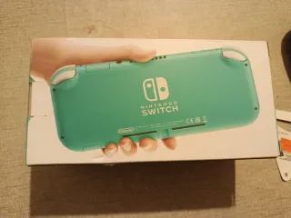 NUEVA SIN ABRIR Nintendo switch lite + funda