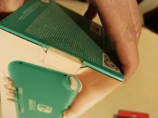 NUEVA SIN ABRIR Nintendo switch lite + funda