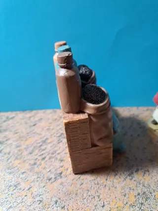 Figura Belén Mujer con puesto de especias