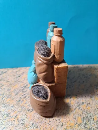 Figura Belén Mujer con puesto de especias