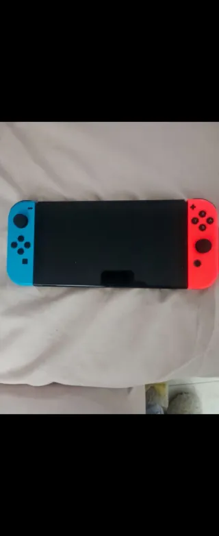 Nintendo Switch OLED Casi Nueva Con Caja