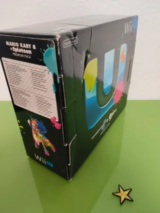 Console Wii U nera con giochi