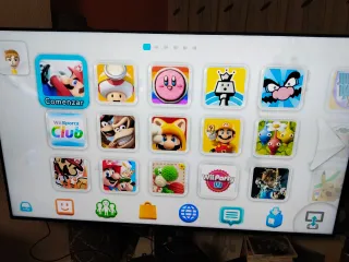 Console Wii U nera con giochi