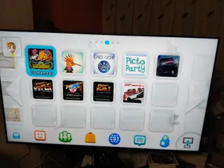 Console Wii U nera con giochi