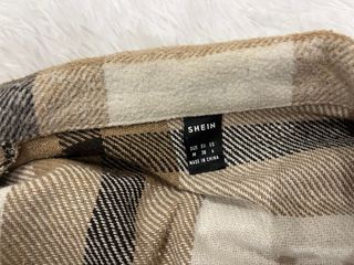 Abrigo teddy cuadros