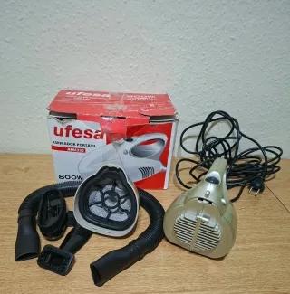 Aspirador portatil ideal para coches e interiores