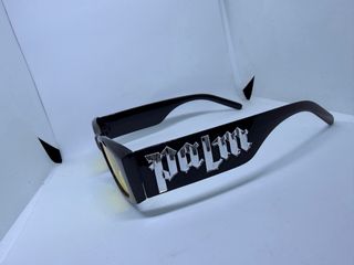 Gafas de sol amarillas estilo moderno