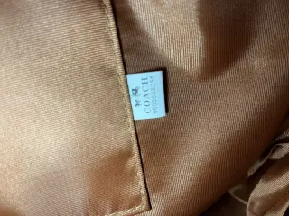 Bolso Coach con estampado de cerezas