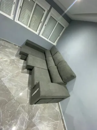 Sofá modular gris tela