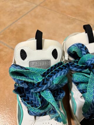 Scarpe da ginnastica bianche e teal tipo balenciag