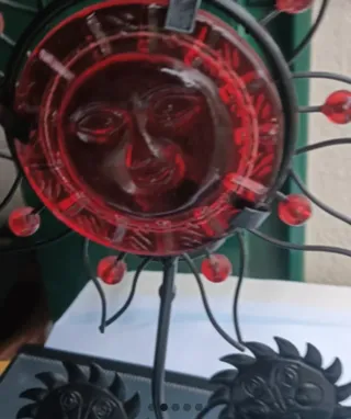 Porta candela sole in ferro e vetro rosso