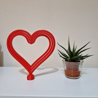 Corazón rojo articulado