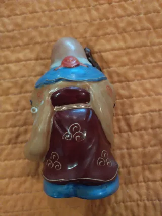 Figura oriental antigua bastón