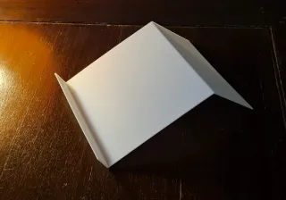 Soporte para libros o mangas o algún comic.