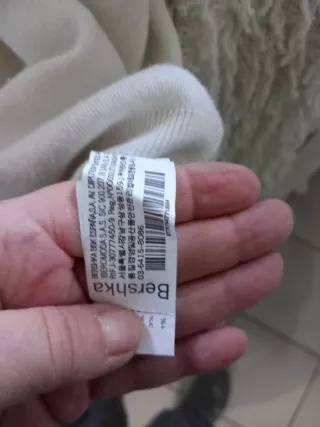 Maglione bianco lavorato a mano