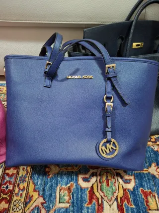 Borse Michael Kors usate verdi e rosa