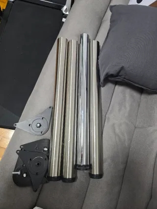 Cuatro patas para mesa de acero.