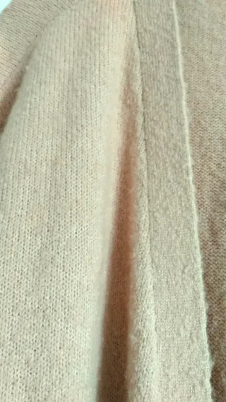 Chaqueta larga de punto rosa