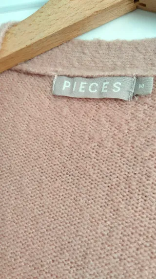 Chaqueta larga de punto rosa