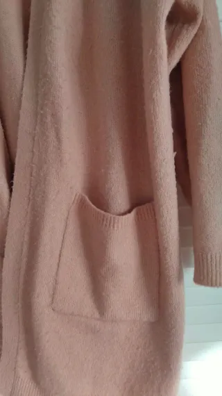 Chaqueta larga de punto rosa