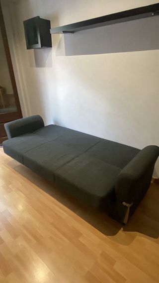 Sofá cama gris de tela