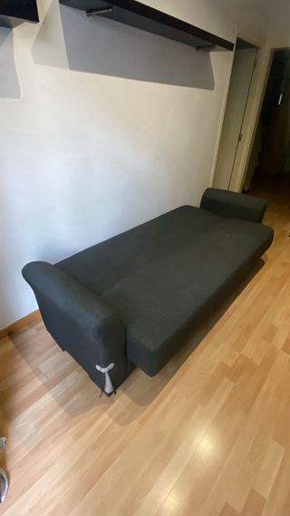 Sofá cama gris de tela