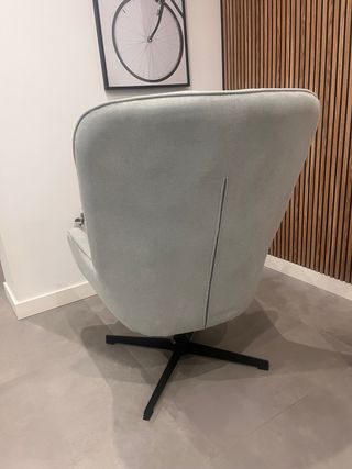 Sillón giratorio tapizado azul