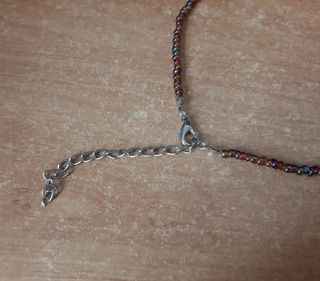 Collana lunga stile boho con sfere all'uncinetto