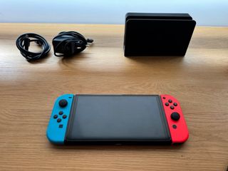 Nintendo Switch OLED Azul/Rojo + Accesorios