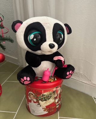 Oso panda interactivo con biberón . Mueve los ojos