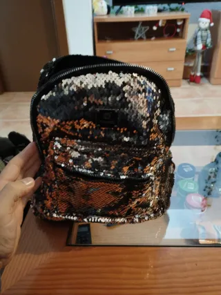 Mochila lentejuelas negra y dorada