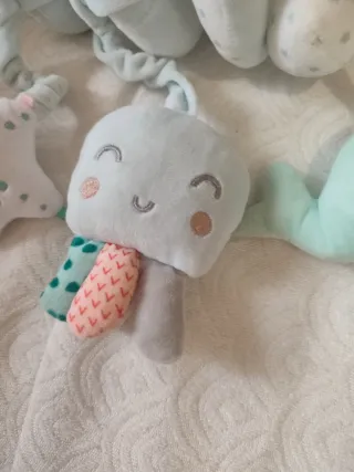 Juguete espiral para carrito de bebé